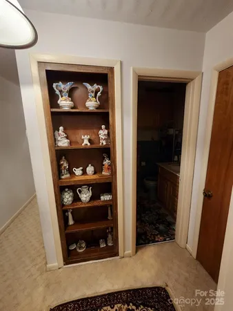 a bathroom with a sink mirror and toilet