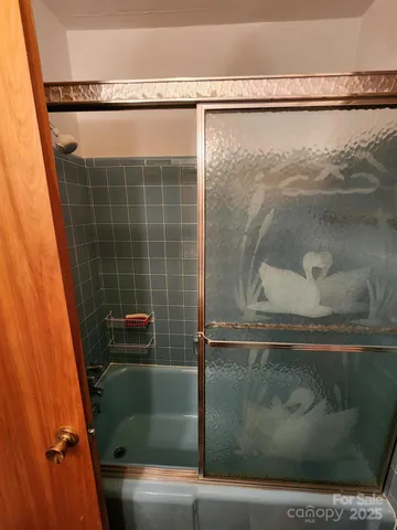 a room with furniture and gym equipment