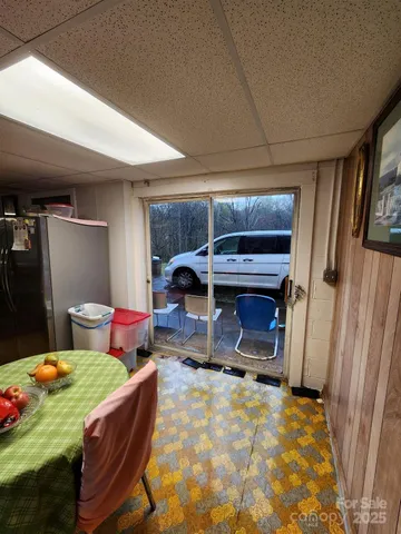 a room with furniture and a rug