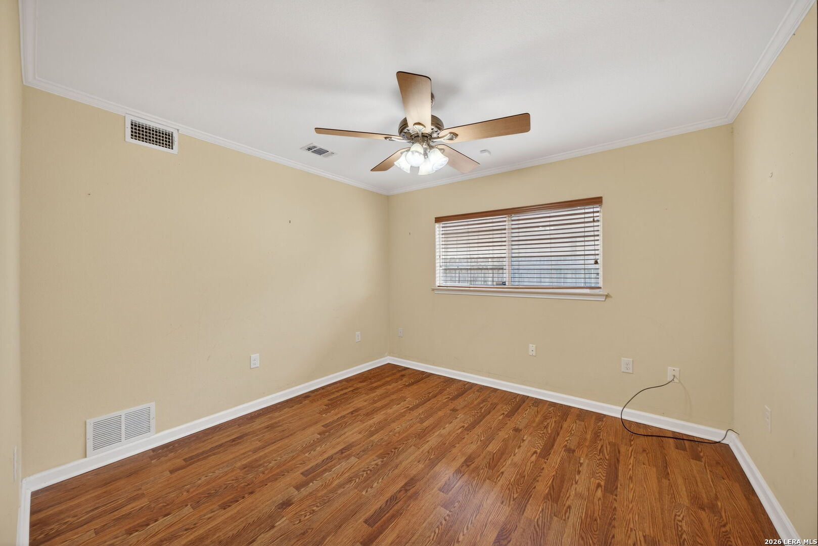 121 Fort Wayne Universal City, TX 78148 - Photo 26 of 34 a view of a room with wooden floor and a ceiling fan