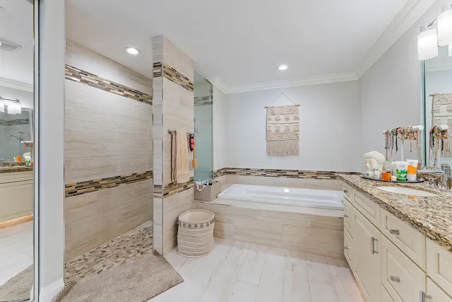 a view of living room filled with furniture and a potted plant