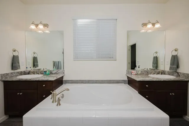 a bedroom with a workspace