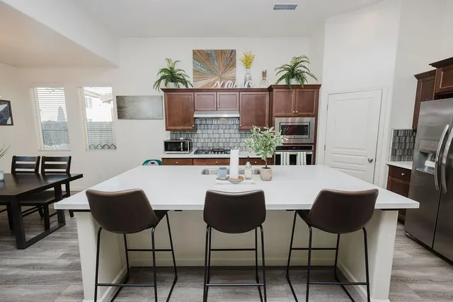 a view of a dining room with furniture
