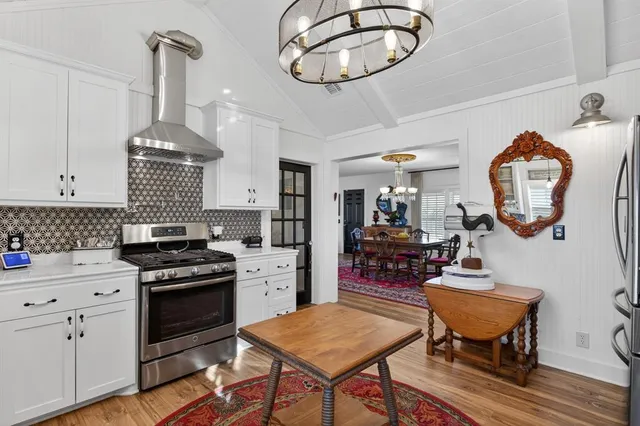 a room with furniture a desk and chair