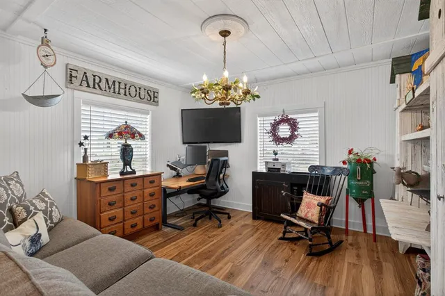 a bed room with furniture and a window