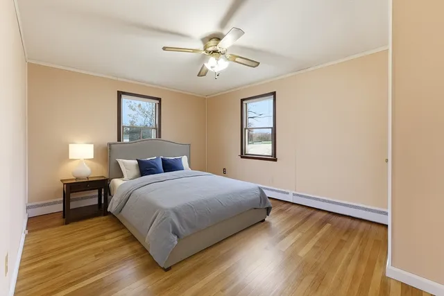 a bedroom with a bed and a table