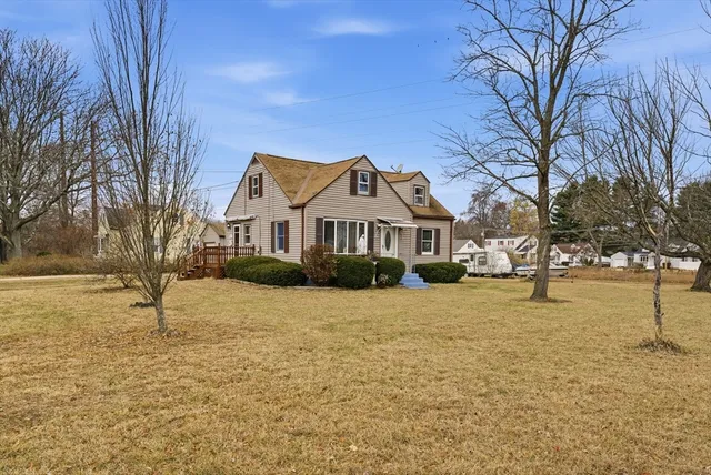 a front view of a house with a yard