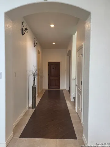 a view of a living room and hardwood floor