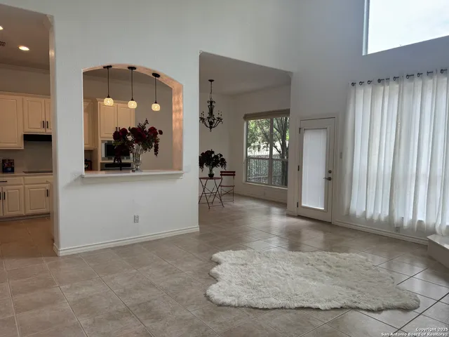 an entryway at livingroom with furniture and windows