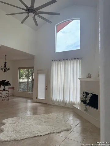a view of a dining room with furniture and window