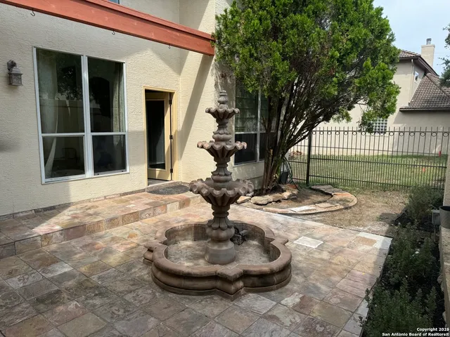 a vase of flowers sitting on a table