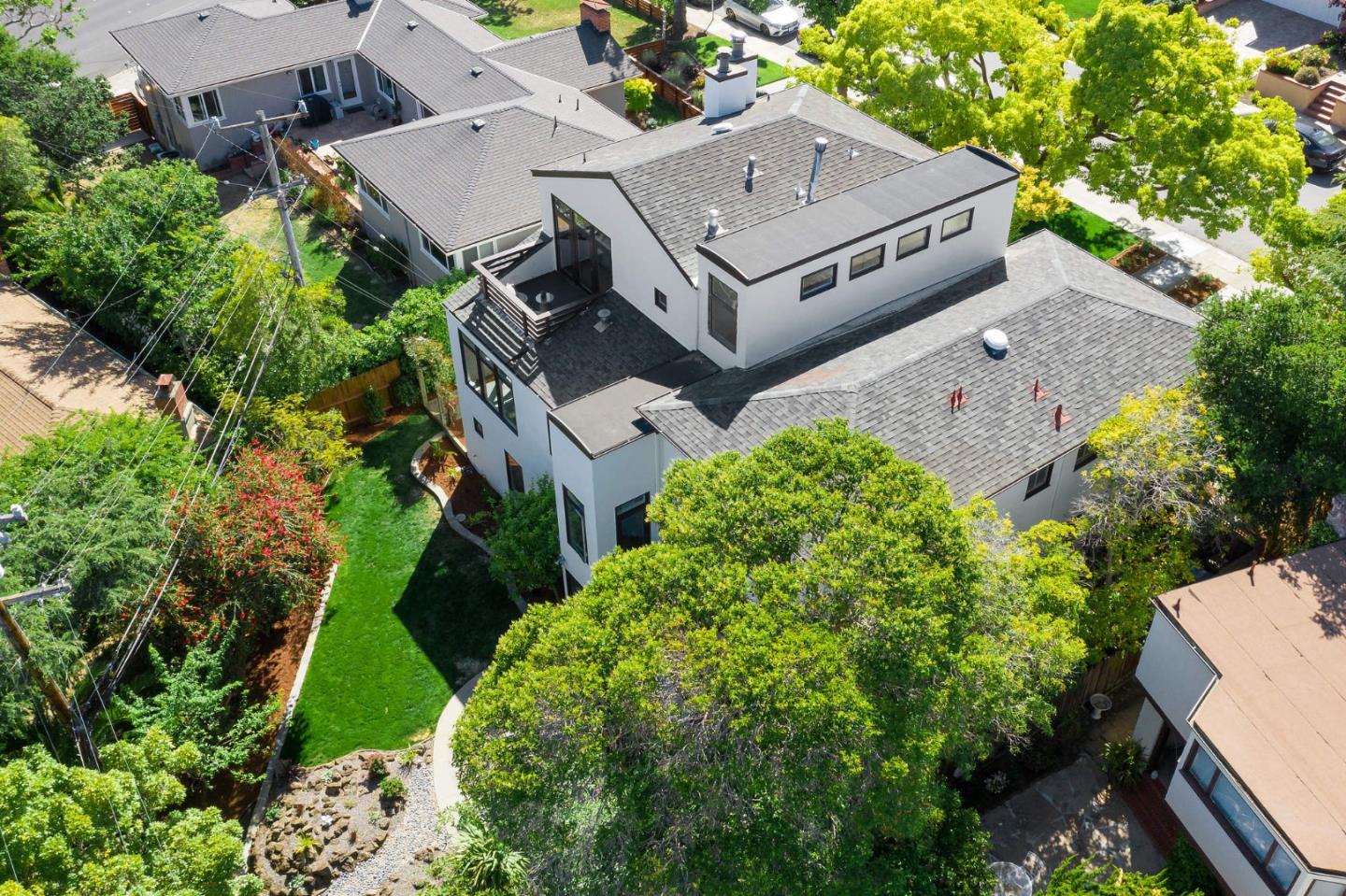 541 Nevada Avenue San Mateo, CA 94402 - Photo 11 of 100 an aerial view of a house with a big yard and large tree