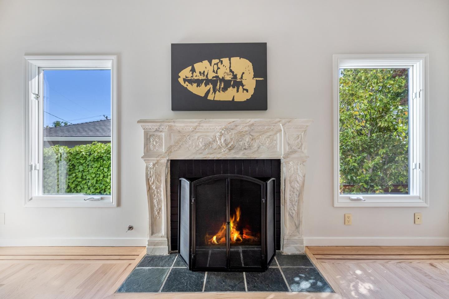 541 Nevada Avenue San Mateo, CA 94402 - Photo 27 of 100 a living room with furniture and a fireplace