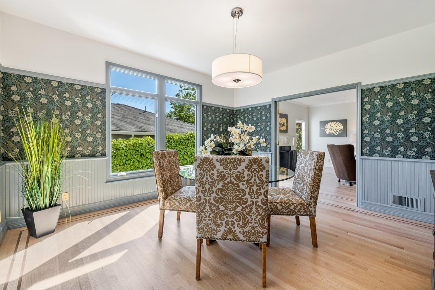 541 Nevada Avenue San Mateo, CA 94402 - Photo 32 of 100 a view of a dining room with furniture window and wooden floor