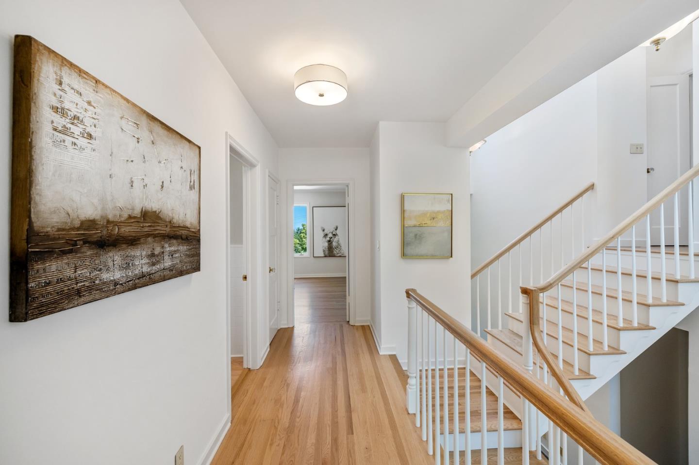 541 Nevada Avenue San Mateo, CA 94402 - Photo 74 of 100 a view of a hallway with wooden floor and staircase