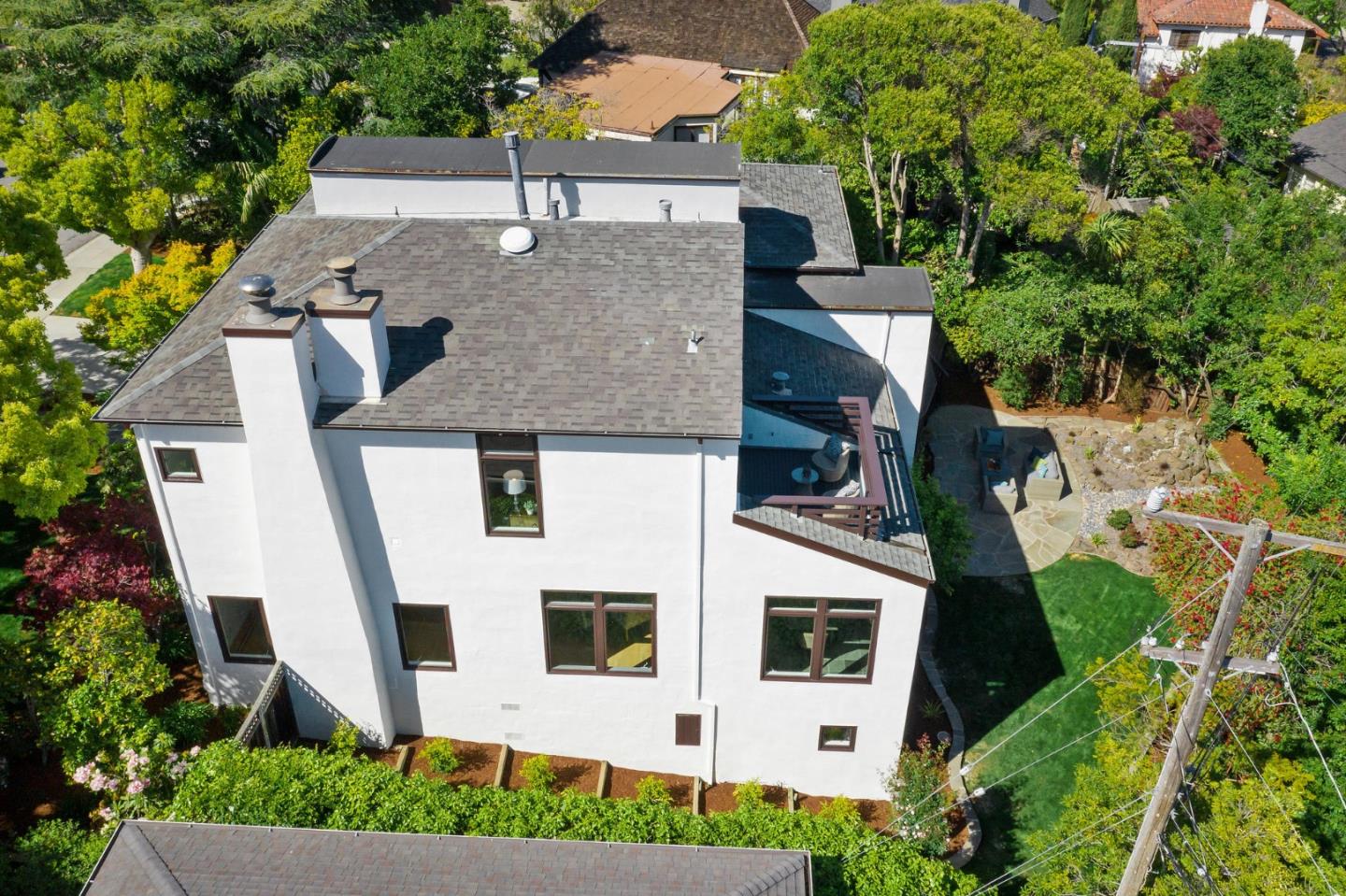 541 Nevada Avenue San Mateo, CA 94402 - Photo 8 of 100 an aerial view of a house with a yard and trees