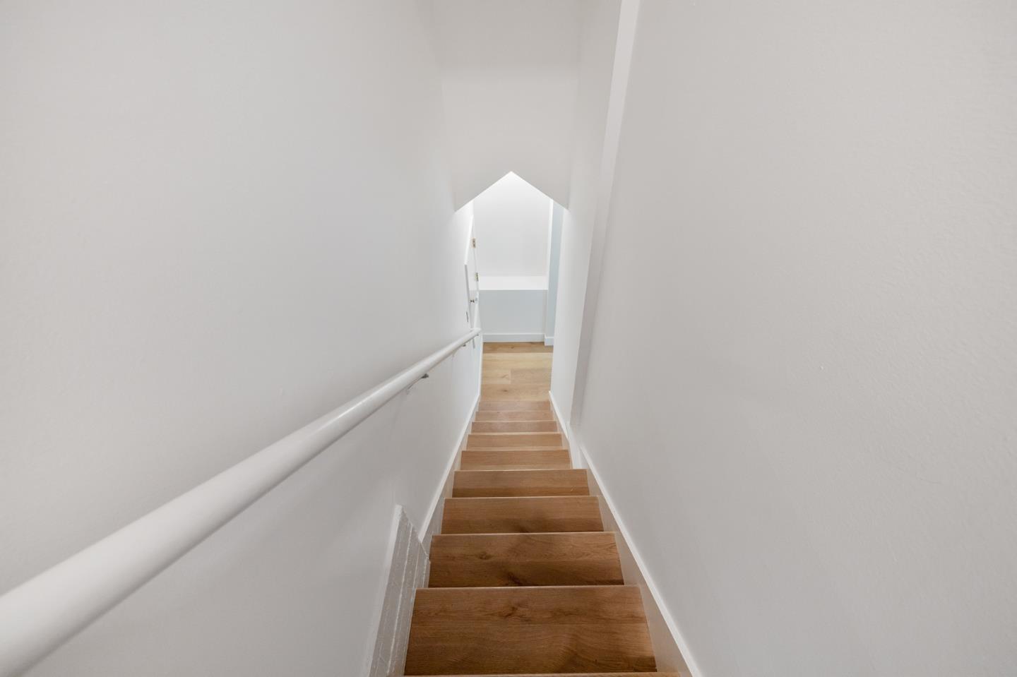 541 Nevada Avenue San Mateo, CA 94402 - Photo 91 of 100 a view of a hallway with wooden floor