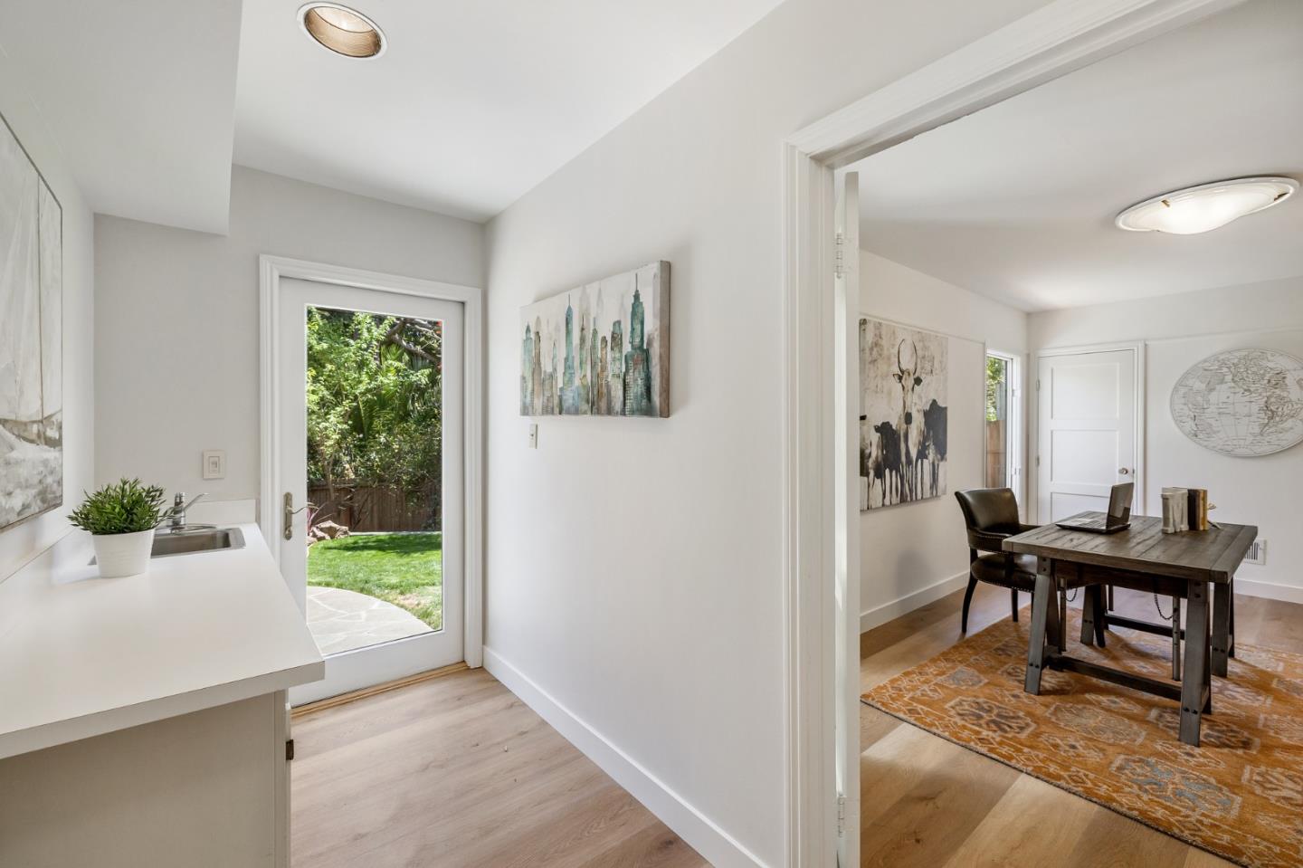 541 Nevada Avenue San Mateo, CA 94402 - Photo 92 of 100 a view of a livingroom and a dining room with wooden floor windows