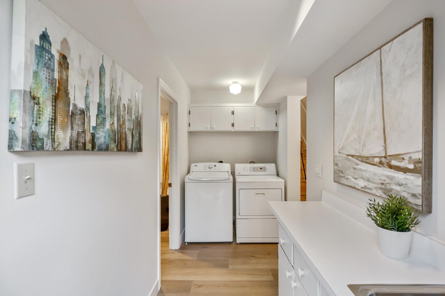 541 Nevada Avenue San Mateo, CA 94402 - Photo 94 of 100 a kitchen with stainless steel appliances a refrigerator and a stove