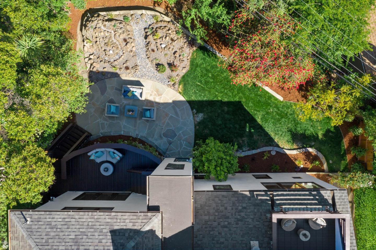 541 Nevada Avenue San Mateo, CA 94402 - Photo 10 of 100 an aerial view of a house with garden space and trees all around
