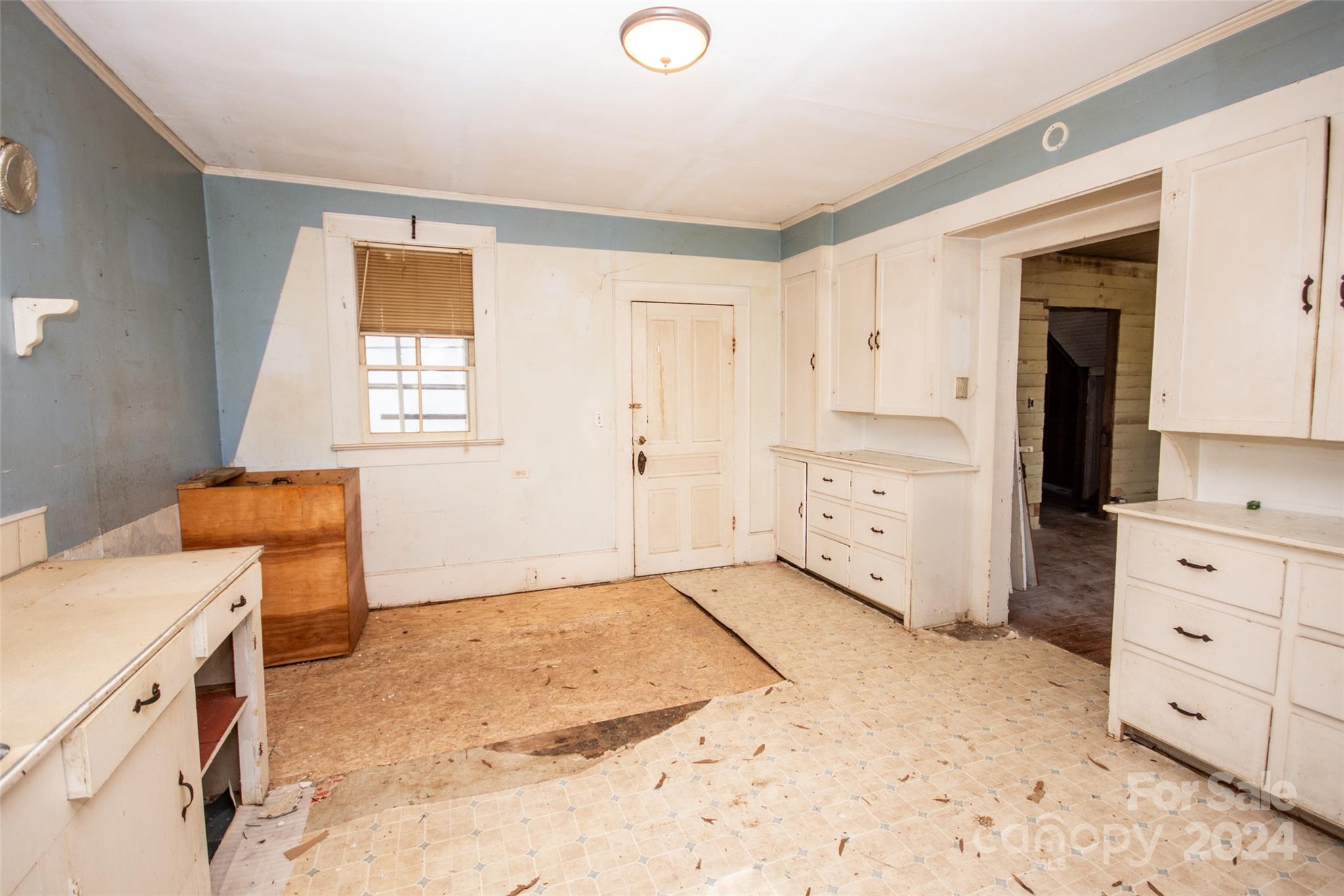 431 Friendship Road Olin, NC 28660 - Photo 12 of 44 a view of kitchen with white cabinets