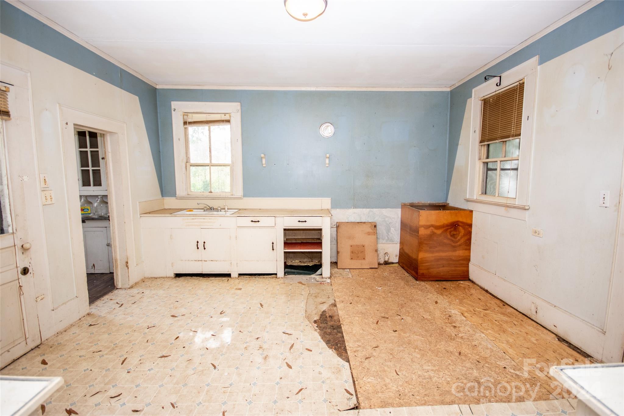 431 Friendship Road Olin, NC 28660 - Photo 14 of 44 a view of a bedroom with furniture and window