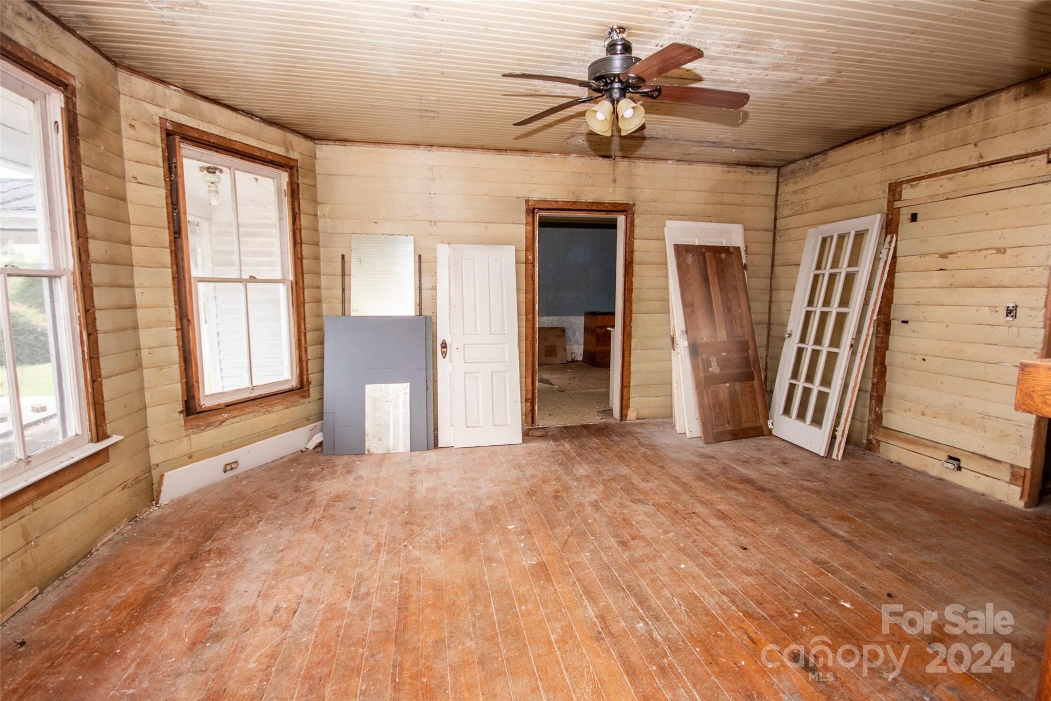431 Friendship Road Olin, NC 28660 - Photo 17 of 44 a view of an empty room with a window