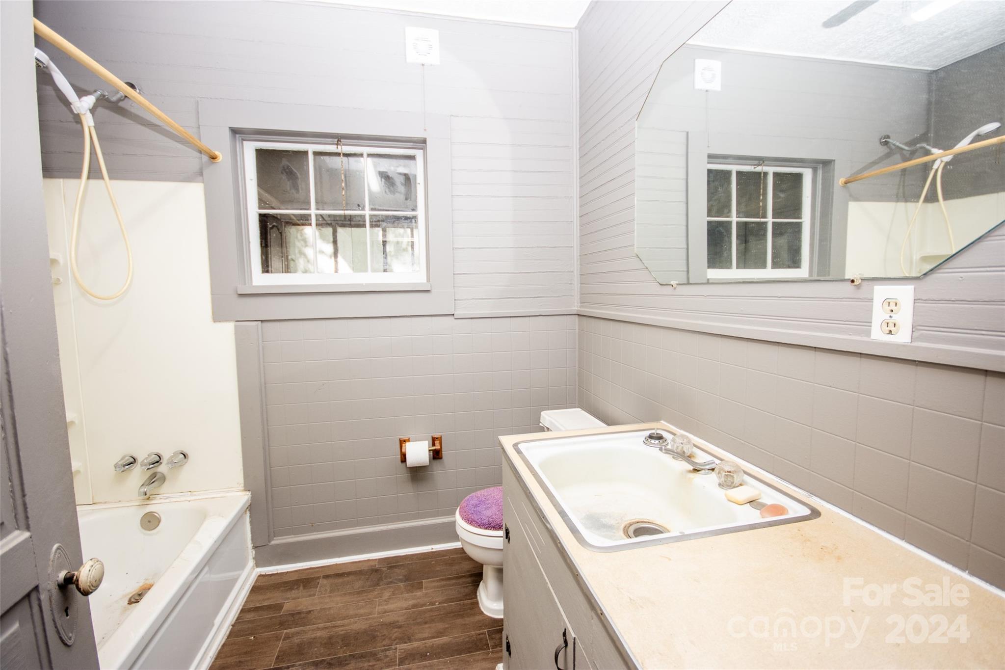 431 Friendship Road Olin, NC 28660 - Photo 27 of 44 a bathroom with a sink and a bathtub
