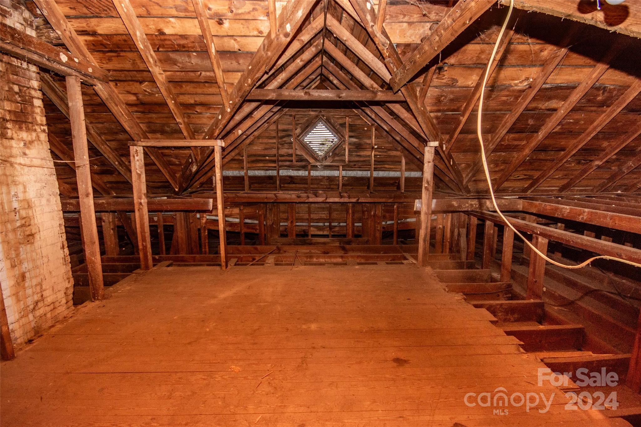 431 Friendship Road Olin, NC 28660 - Photo 29 of 44 a view of an empty room with wooden walls