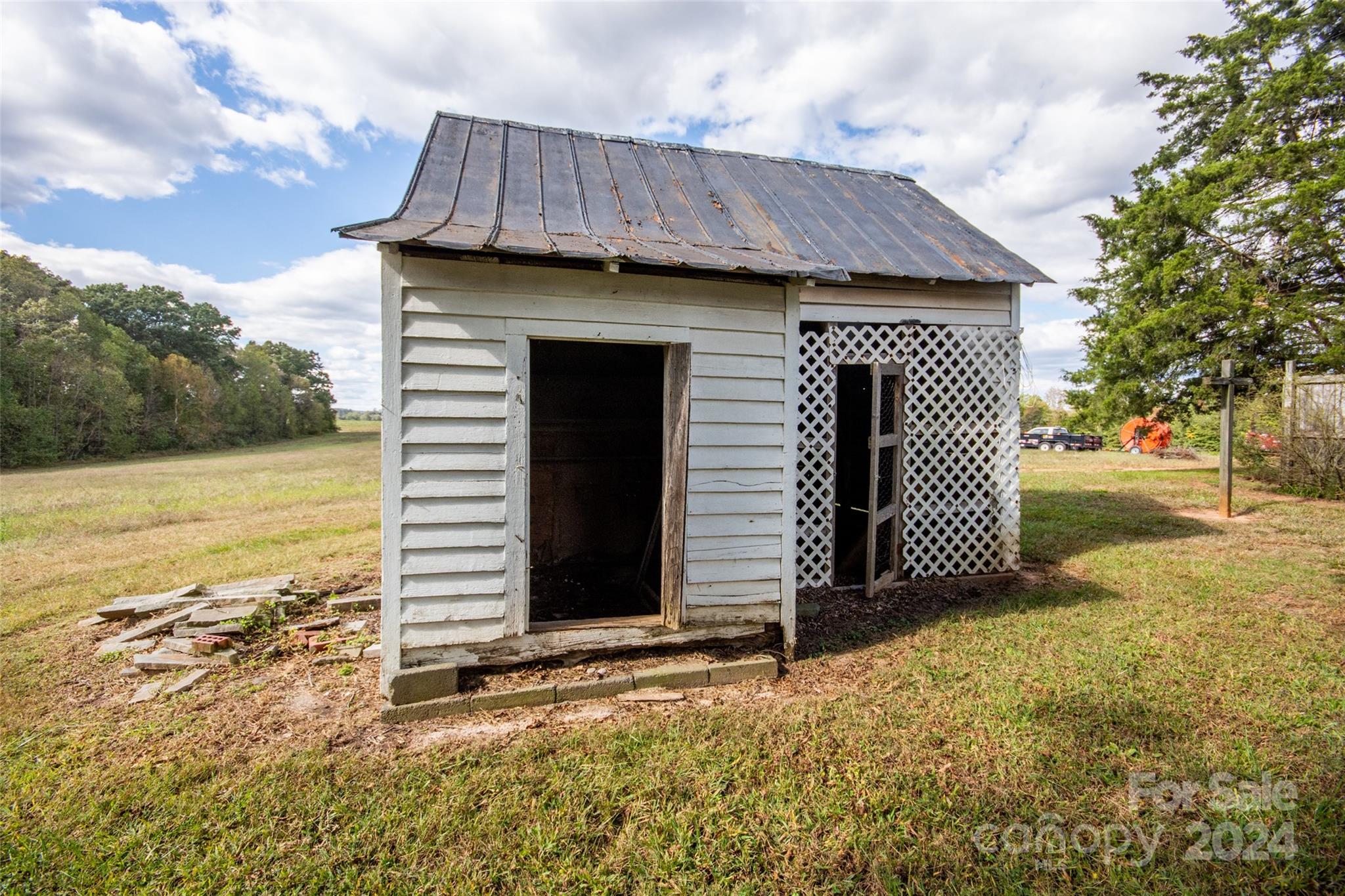 431 Friendship Road Olin, NC 28660 - Photo 33 of 44 a view of a house with wooden fence