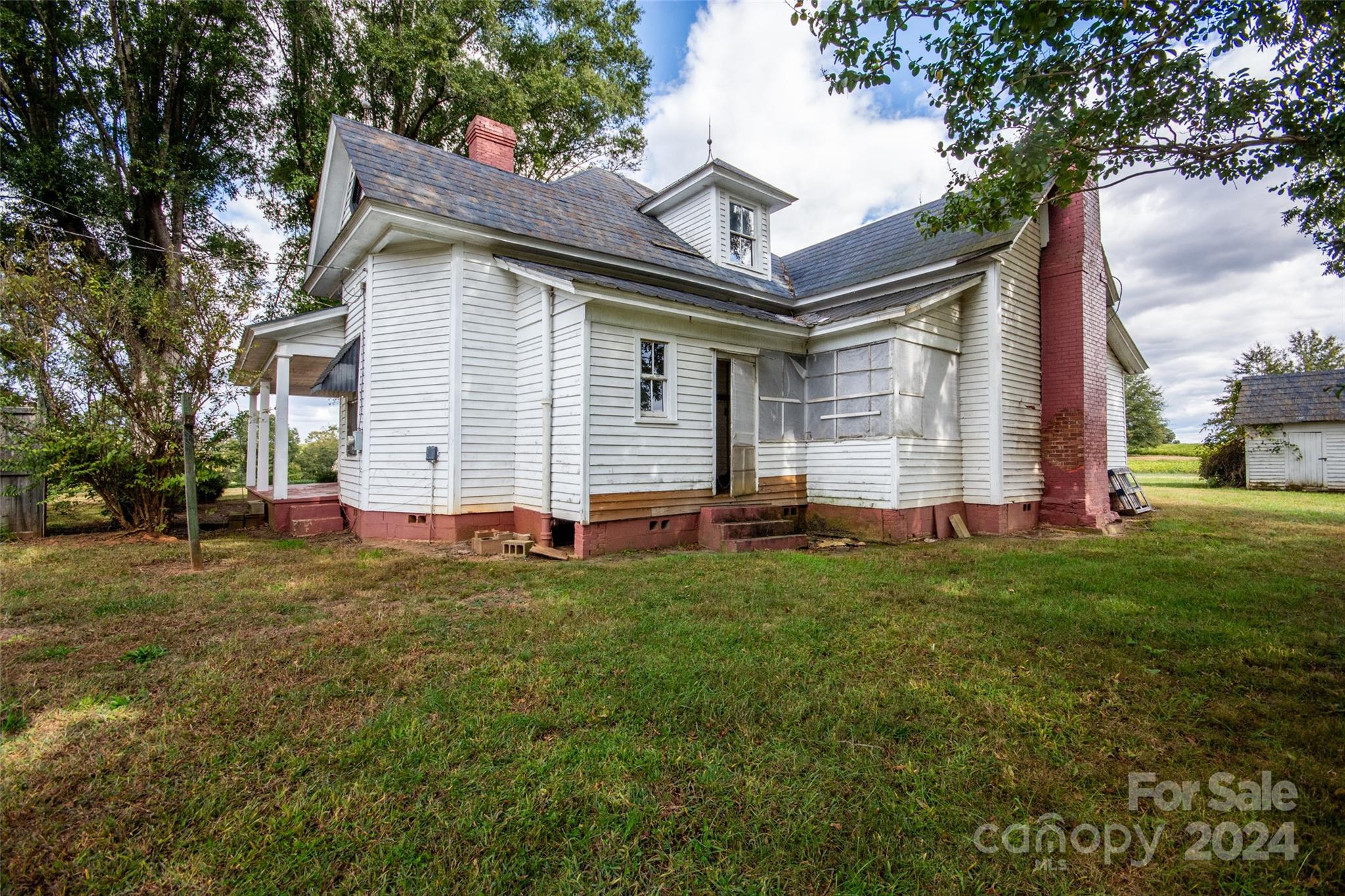 431 Friendship Road Olin, NC 28660 - Photo 34 of 44 a view of a backyard with a garden