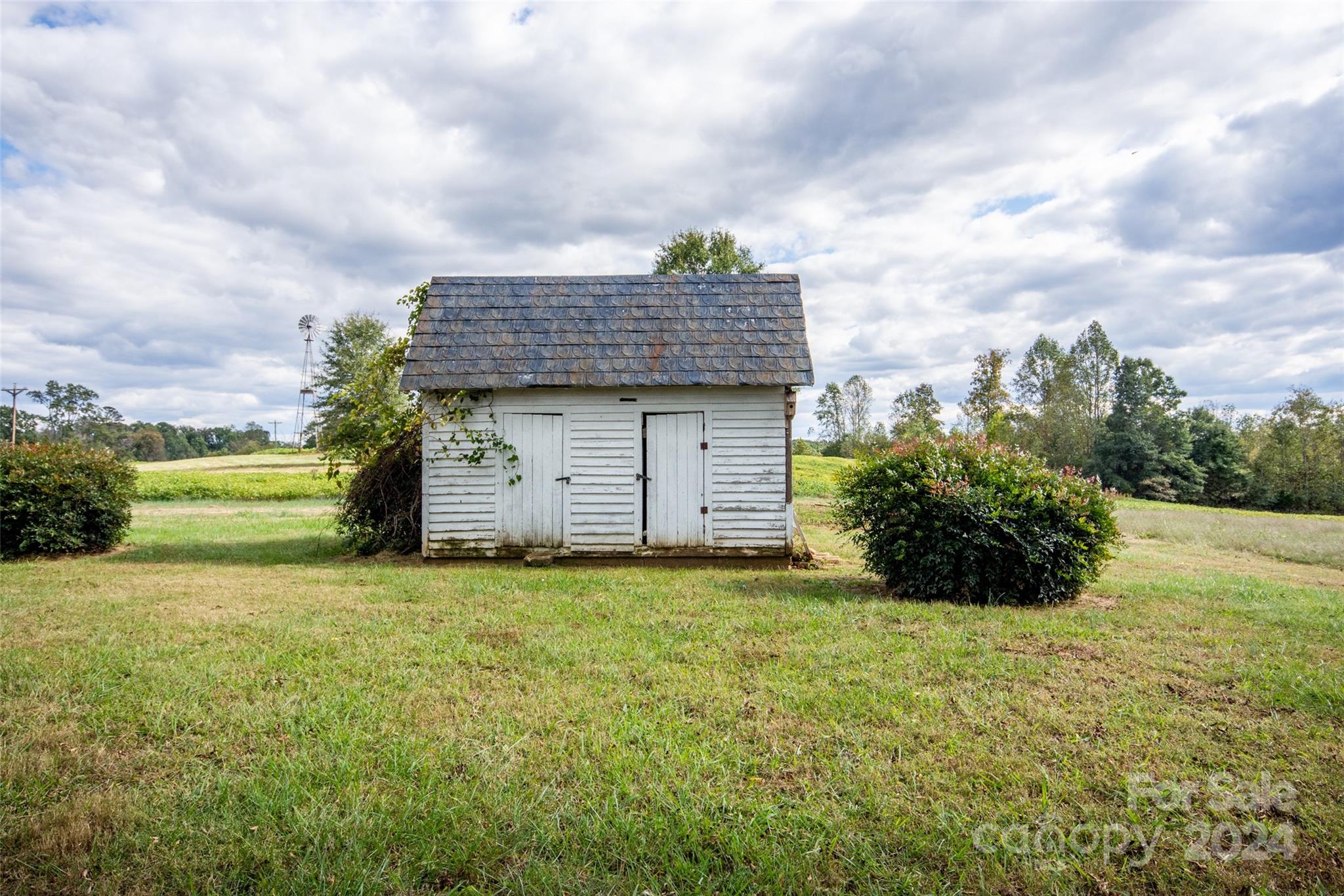 431 Friendship Road Olin, NC 28660 - Photo 35 of 44 a view of a house with a yard