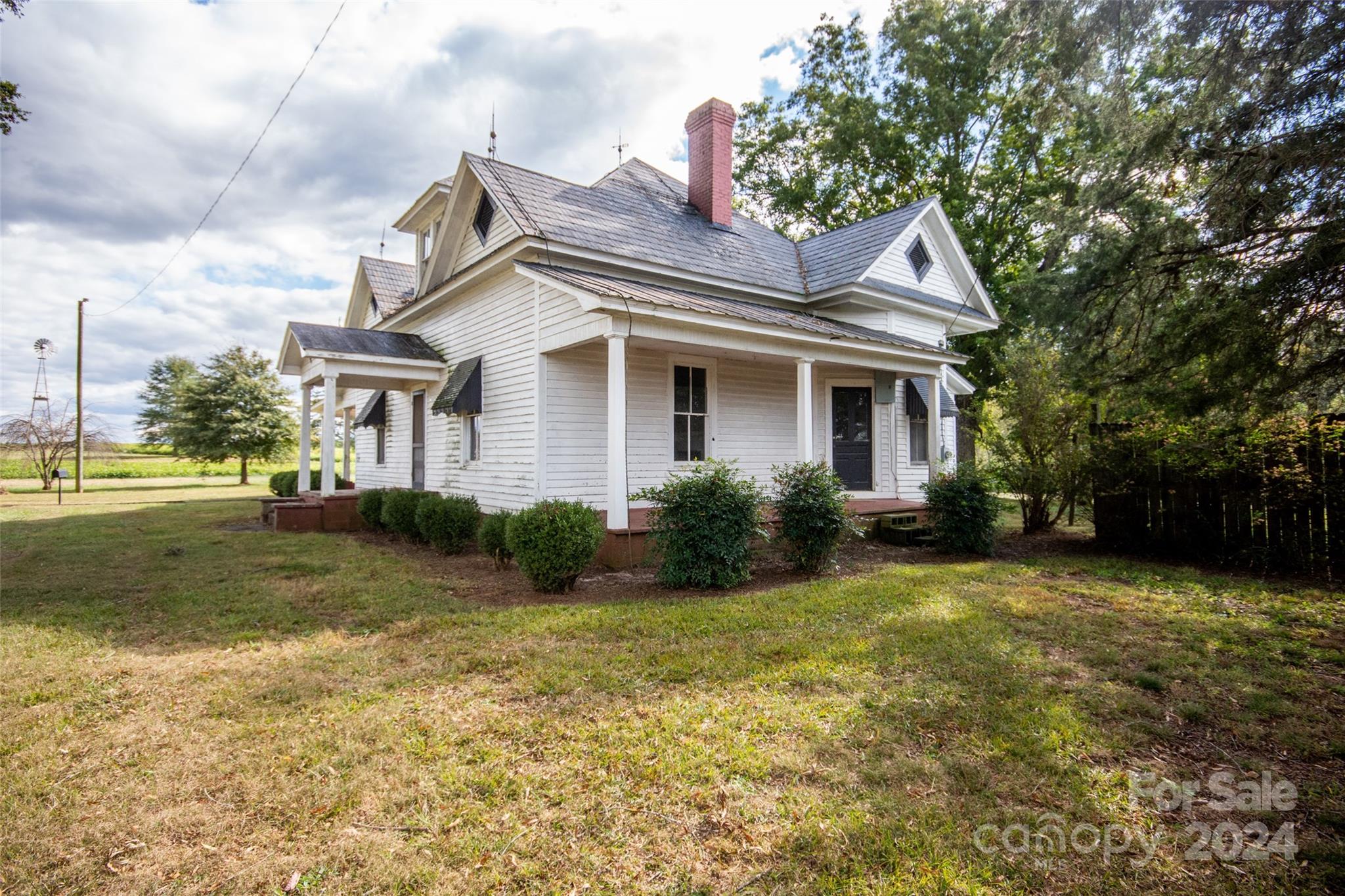 431 Friendship Road Olin, NC 28660 - Photo 4 of 44 a view of a house with backyard and garden