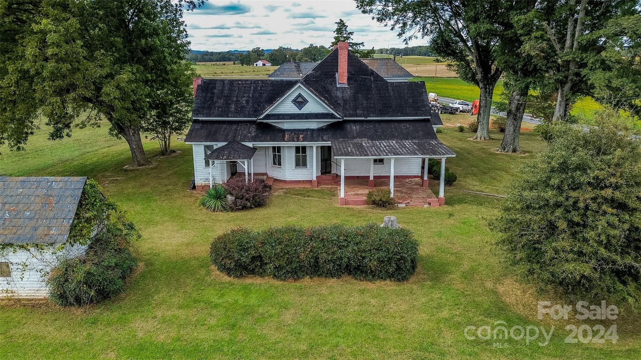 431 Friendship Road Olin, NC 28660 - Photo 41 of 44 an aerial view of a house