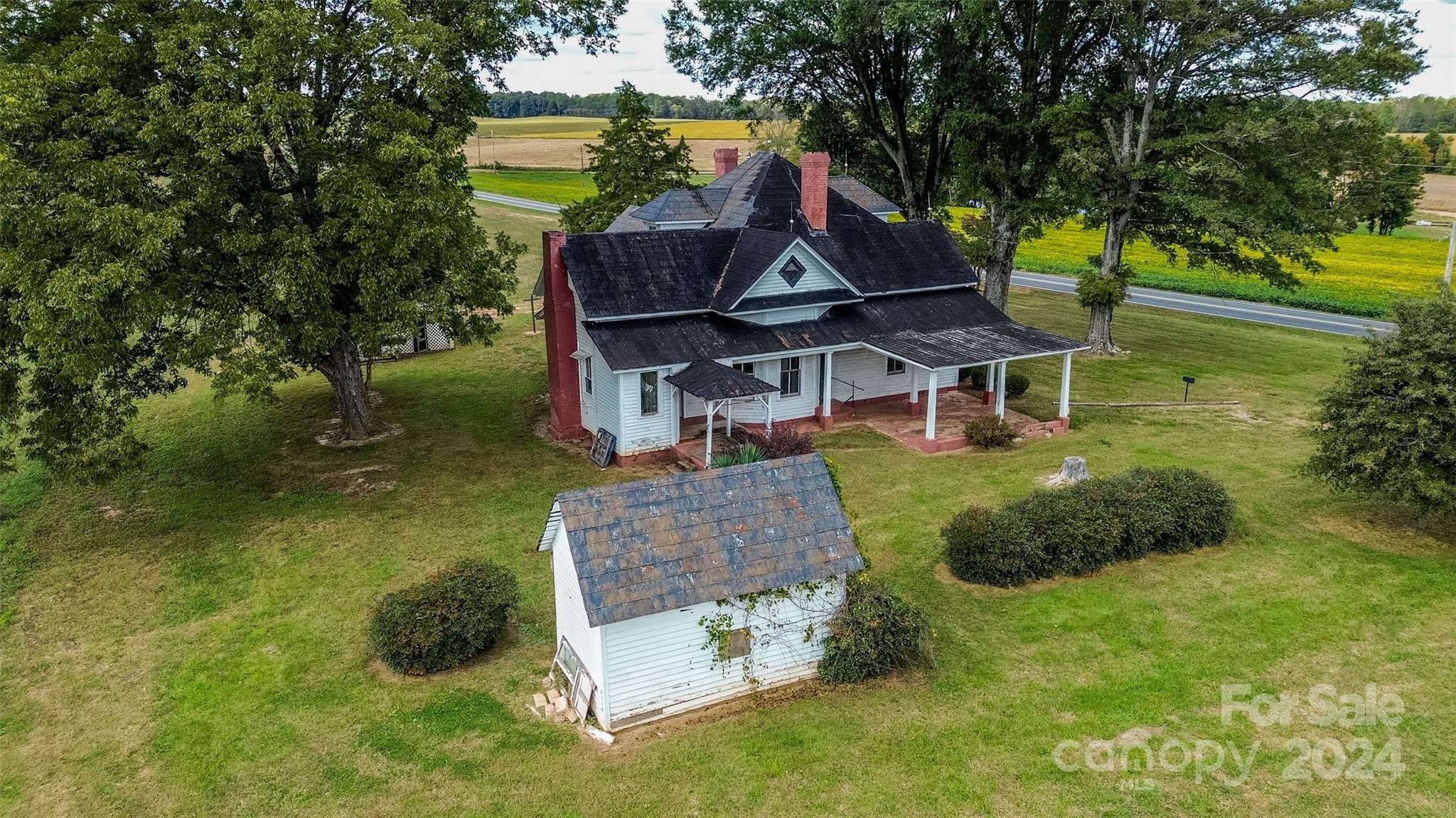 431 Friendship Road Olin, NC 28660 - Photo 42 of 44 a aerial view of a house with swimming pool garden and patio
