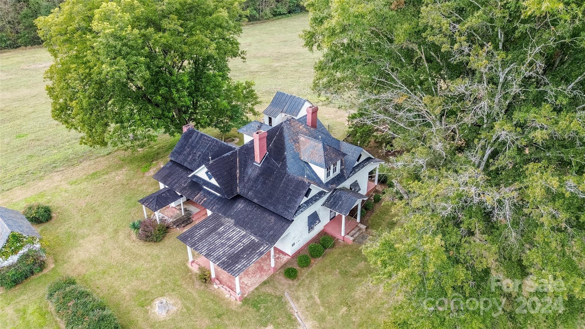 431 Friendship Road Olin, NC 28660 - Photo 7 of 44 a view of a house with a yard