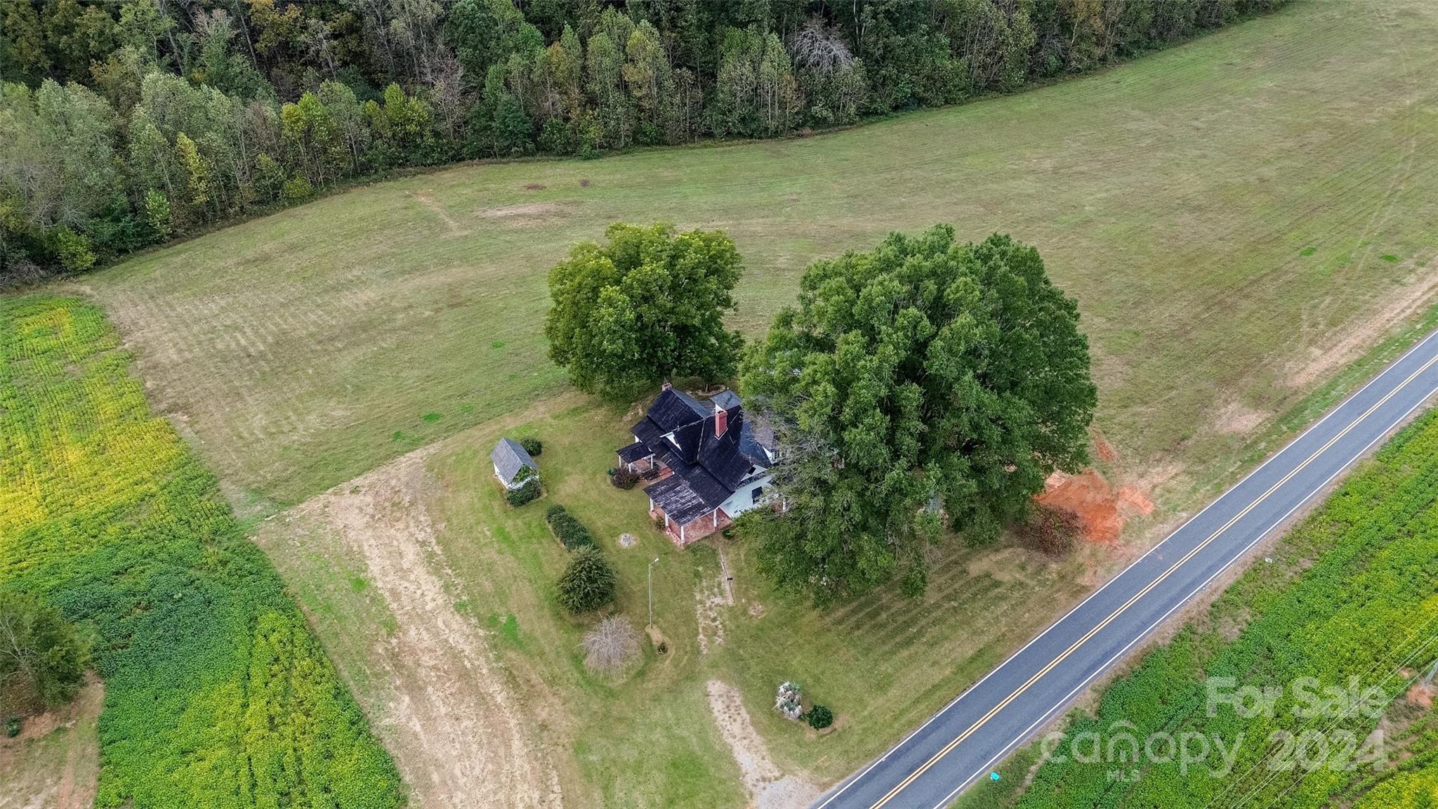 431 Friendship Road Olin, NC 28660 - Photo 9 of 44 a view of a yard