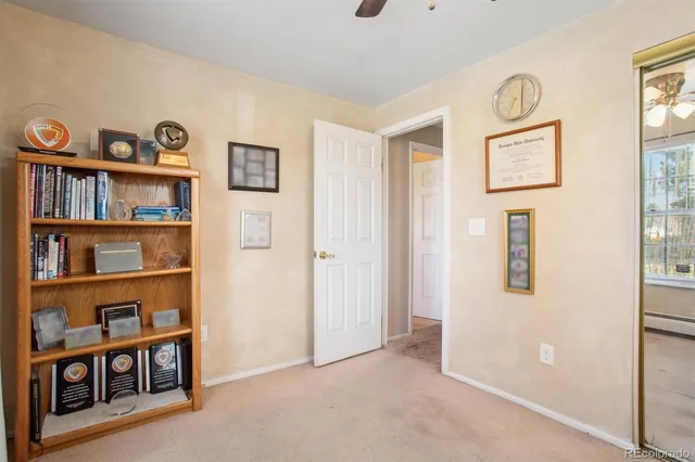 a view of a livingroom with shelves