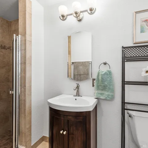 a view of outdoor space with seating area and wooden fence