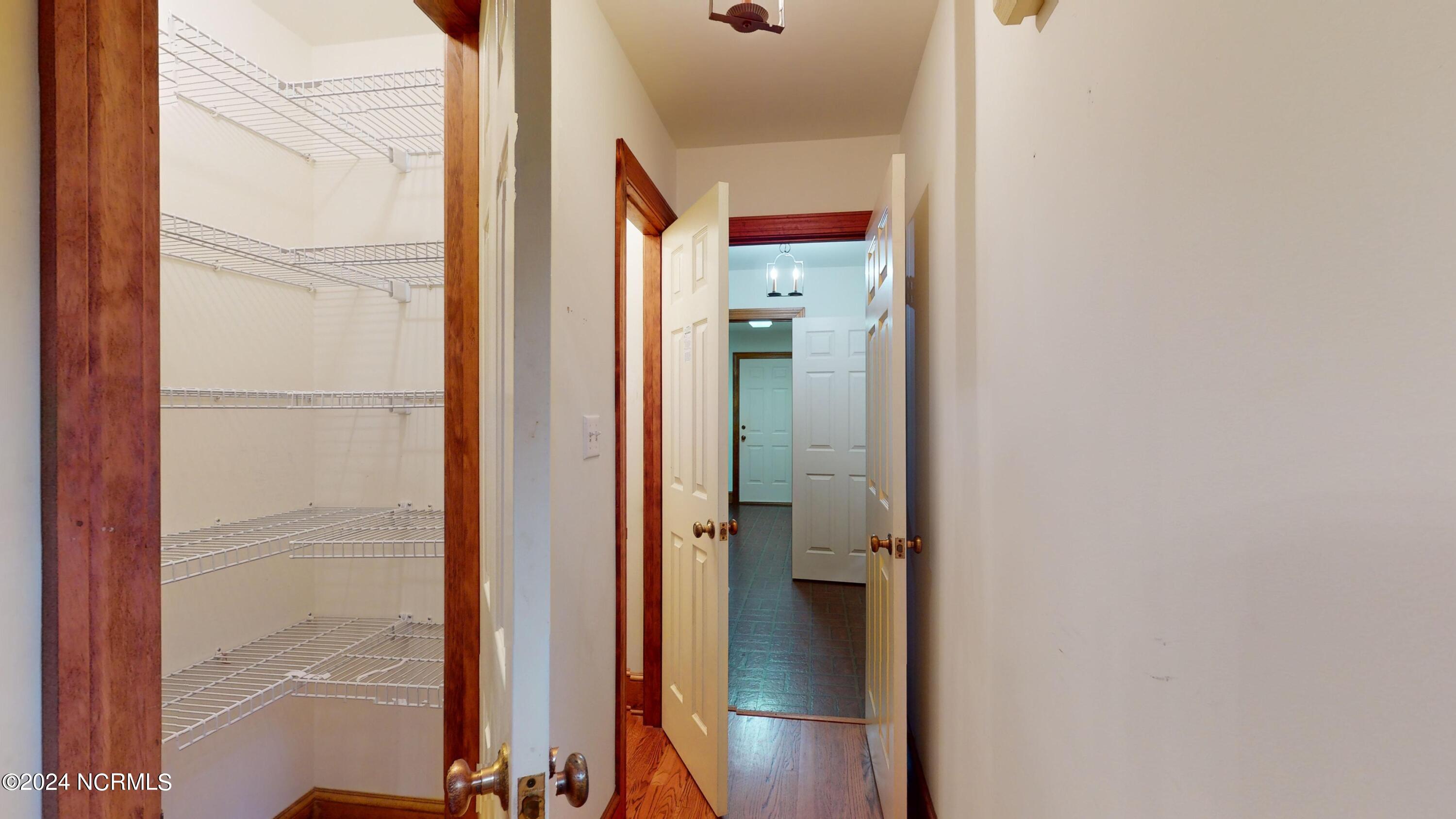 25 Red Fox Run Pinehurst, NC 28374 - Photo 26 of 81 Pantry, Broom closet, and Laundry