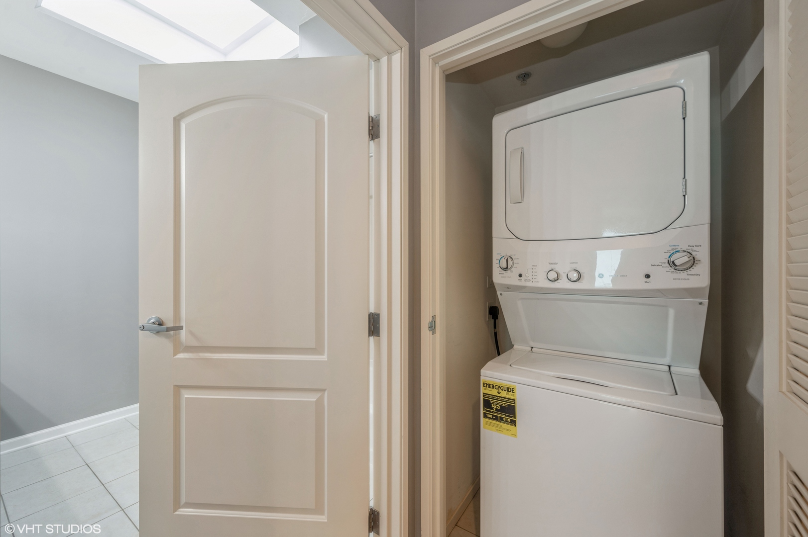 1720 Maple Avenue, Unit 406 Evanston, IL 60201 - Photo 10 of 13 a utility room with dryer and washer