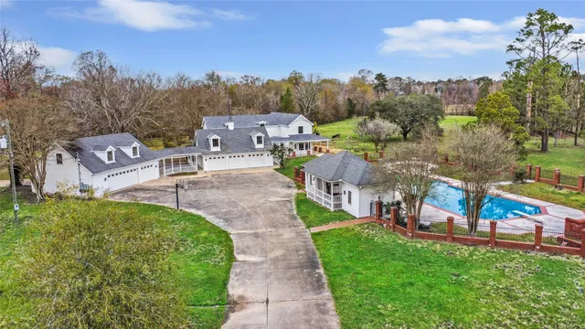 a view of a garden with a building in the background