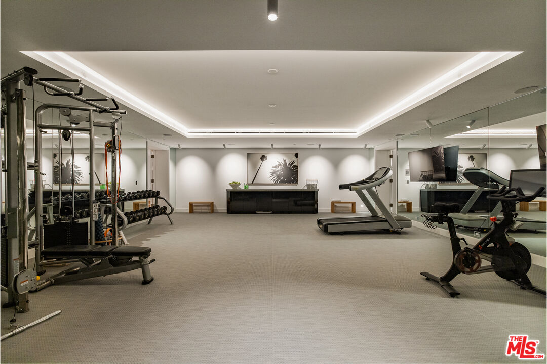 1898 Rising Glen Road Los Angeles, CA 90069 - Photo 34 of 38 a view of a room with gym equipment