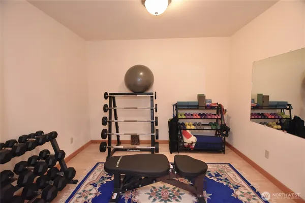 a room with furniture and a flat screen tv