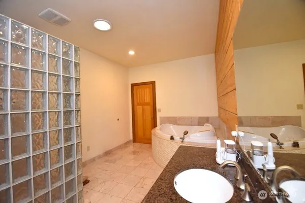 a room with furniture and a flat screen tv