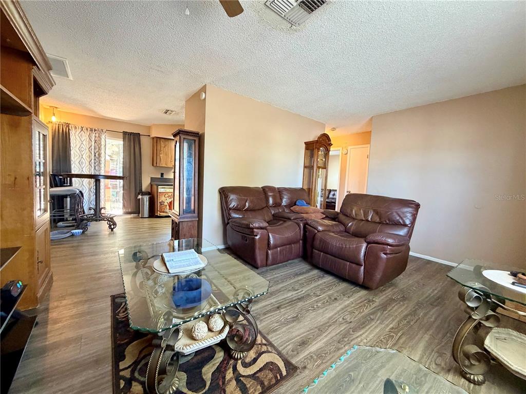 9840 Crofton Lane Port Richey, FL 34668 - Photo 4 of 12 a living room with furniture
