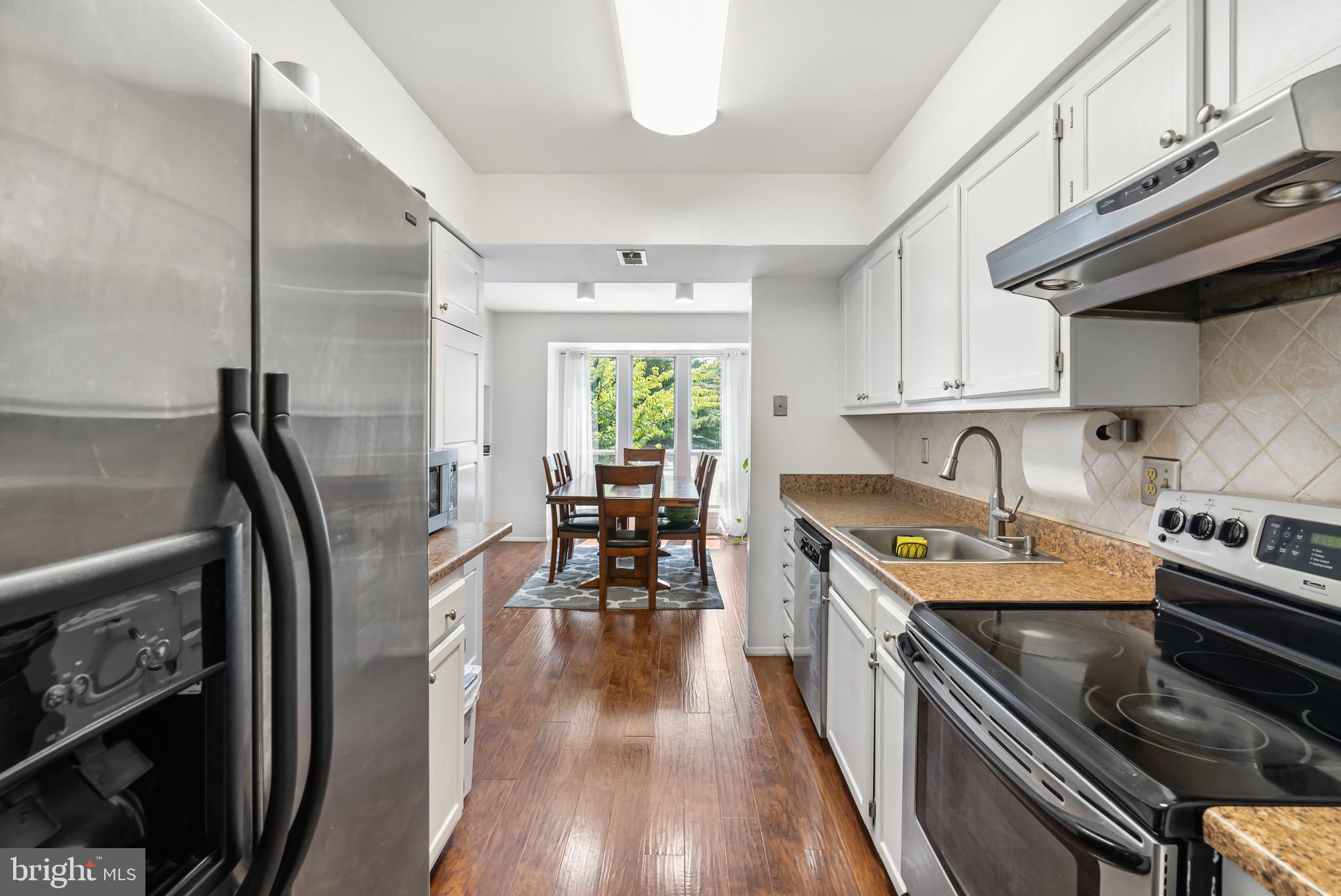 7904 Rustling Bark Court Ellicott City, MD 21043 - Photo 11 of 32 Bright and Airy Kitchen