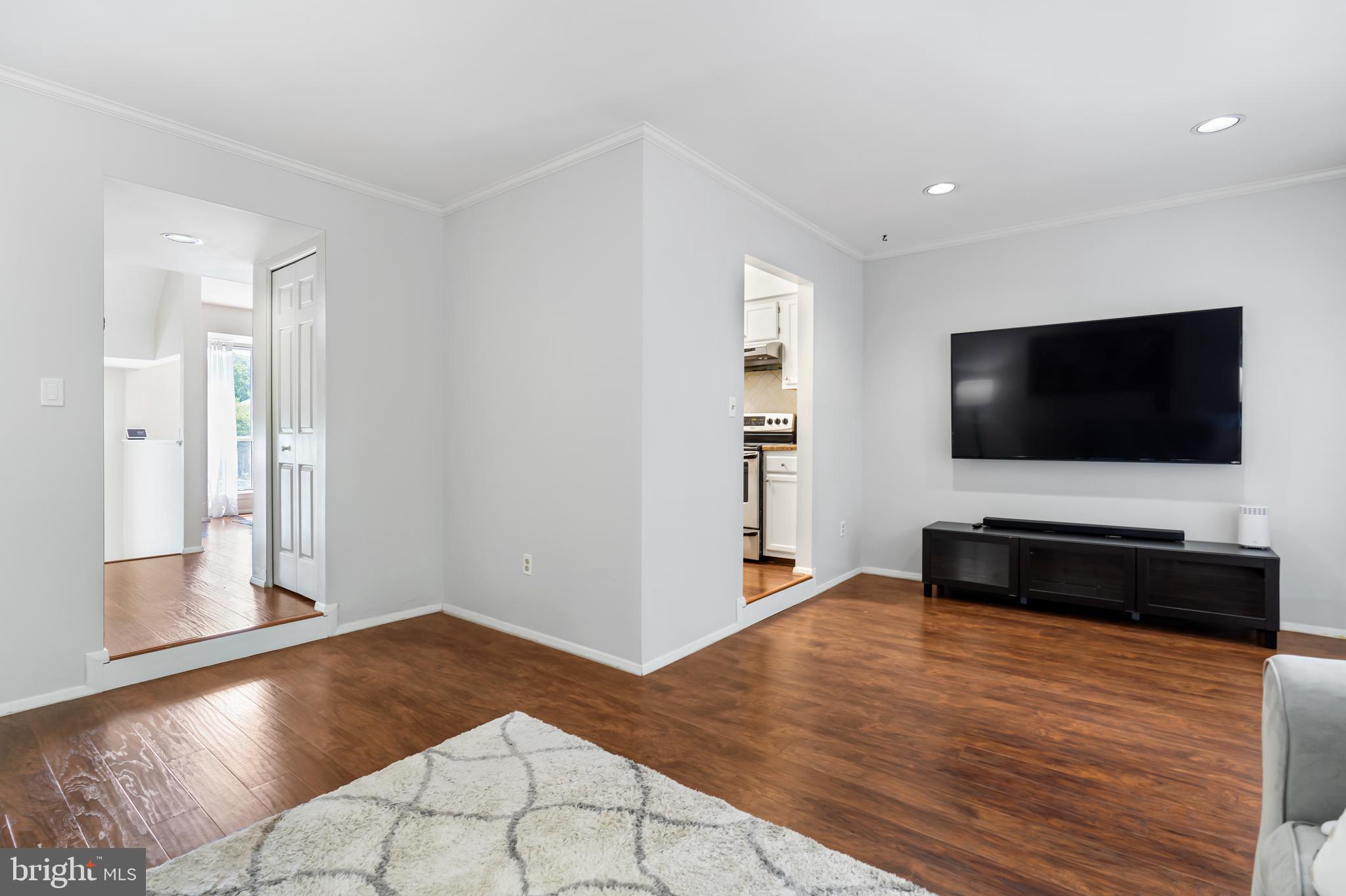 7904 Rustling Bark Court Ellicott City, MD 21043 - Photo 6 of 32 Gorgeous Hardwood Floors Throughout