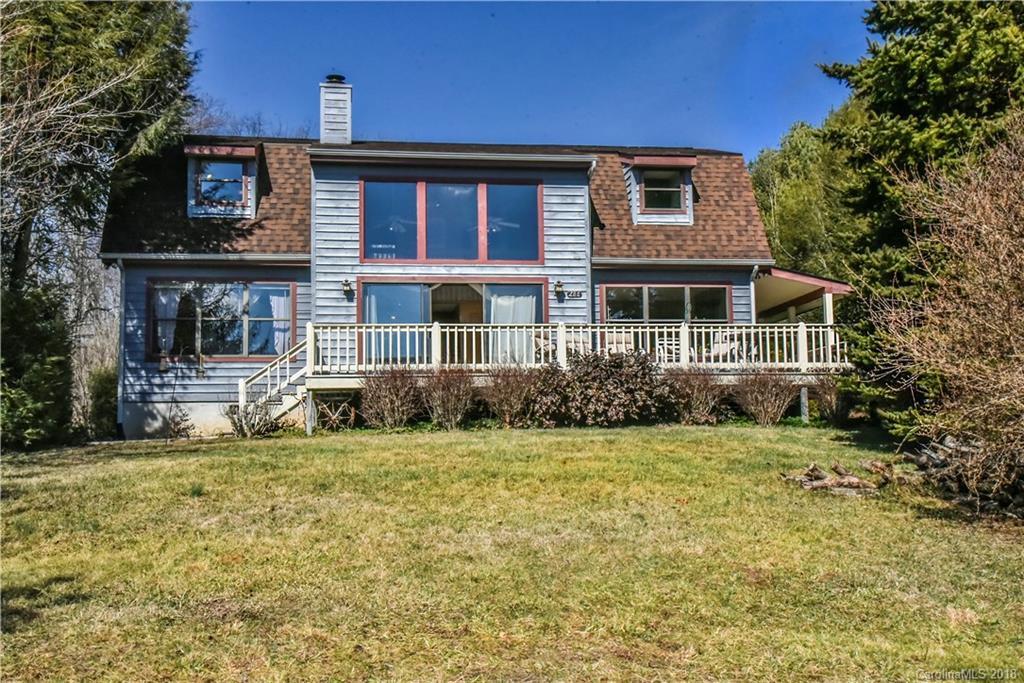 286 Pioneer Ridge Road Canton, NC 28716 - Photo 2 of 33 a house view with a garden space