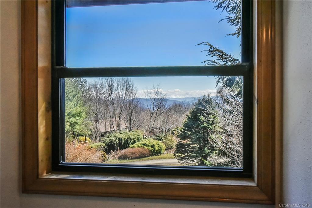 286 Pioneer Ridge Road Canton, NC 28716 - Photo 30 of 33 a view of a window with a painting on a window